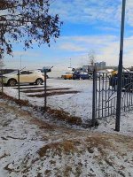 На самовільно зайнятій ділянці у Черкасах почали демонтувати паркан (фото)